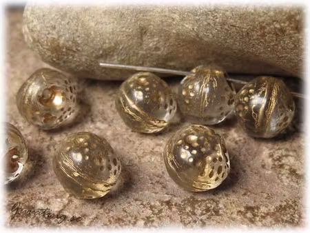 Transparent rund med guldinlägg ca 9,5 mm