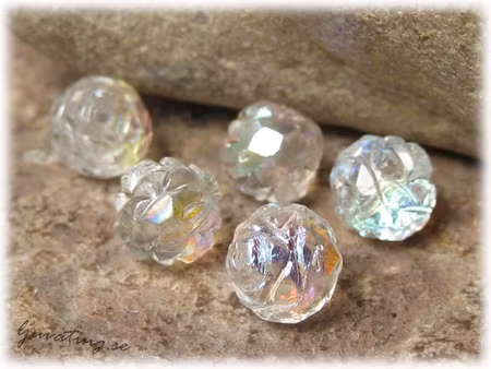 Rund glittrig crystal AB med silver ca 8 mm