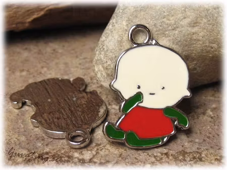 Berlock baby röd/grön/antikvit ca 18x25 mm