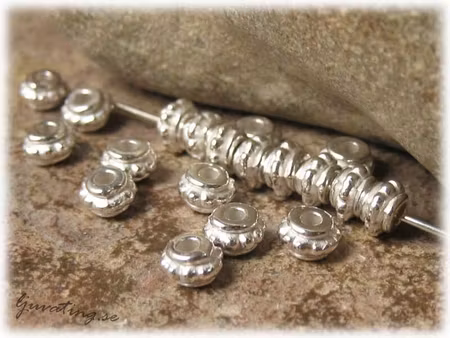 Rondell i metall ljus silverfärgad 20-pack ca 5 mm