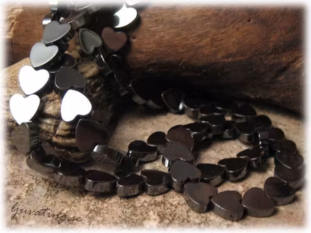 Hematit platt hjärta 10-pack ca 8 mm