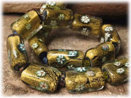 Rektangel guldfoil med blommor ca 20x14 mm