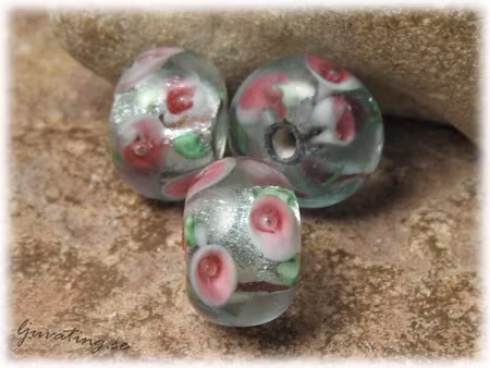 Silverfoil pärla med blommor ca 17x12 mm