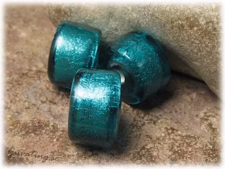 Hjul petrol silverfoil pärla ca 17x11 mm