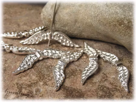 Storpack Vinge ljus silverfärgad 30-pack ca 32x8mm