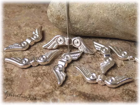 Storpack Vinge ljus silverfärgad 30-pack ca 24x7mm