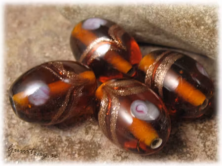 Glaspärla topaz oval med ros ca 20x14 mm