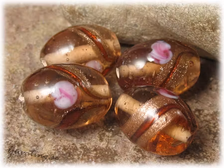 Glaspärla nougat oval med ros ca 20x14 mm