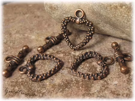 Toggle lås hjärta kopparfärgat ca 19x16 mm