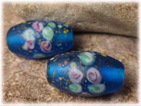 Matt aqua blå oval pärla blommor ca 23x14mm