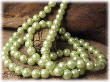 Pärlor i glas rund limegrön 20-pack ca 8 mm