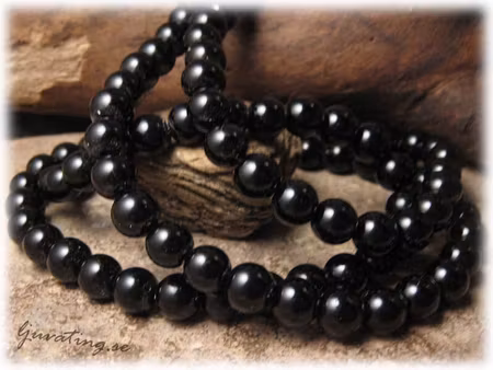 1 sträng vaxad svart rund glaspärla ca 8 mm