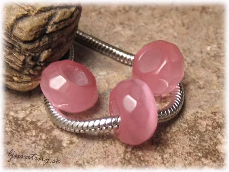 Ormlänkspärla facetterad rosa cat eye ca 13x8 mm