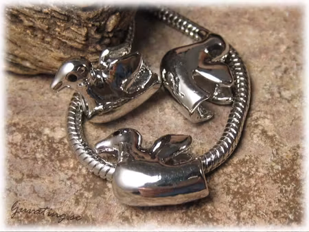 Ormlänkspärla i metall fågel ca 16x15 mm