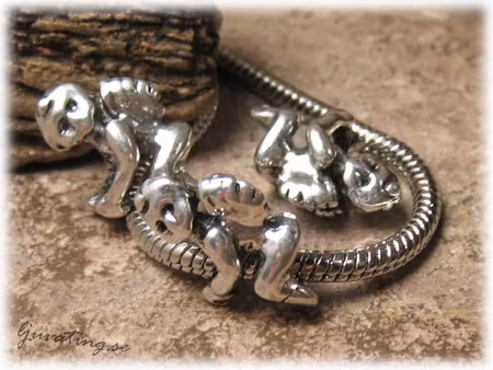 Ormlänkspärla i metall ängel ca 19x14 mm