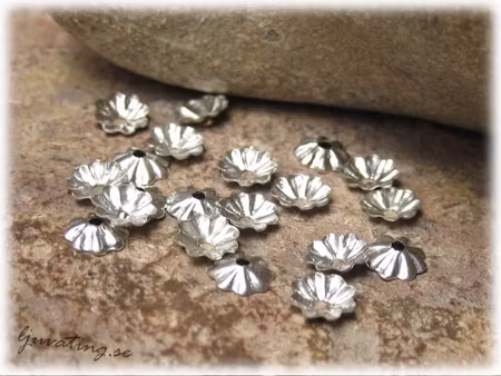 Pärlhatt små silverfärgade 20-pack ca 4 mm