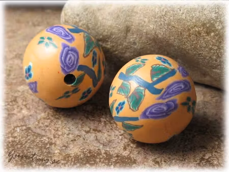 Lerpärla rund ljus orange med blommor ca 20 mm