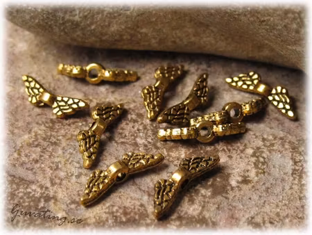 Liten änglavinge antik guld 10-pack ca 12x3 mm