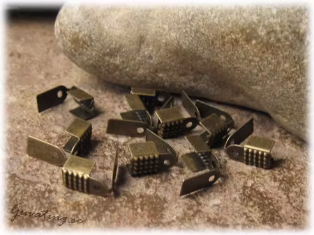 Bronsfärgade avslut 10-Pack ca 9x5 mm