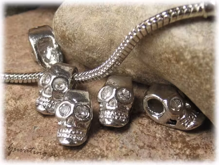 Ormlänkspärla döskalle med strassögon ca 16x9 mm