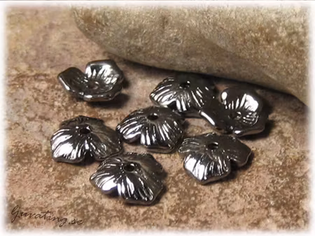 Svart kraftig pärlhatt 3-bladig 10-pack ca 11 mm