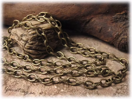 Kedja bronsfärgad med mönster ca 8x5 mm