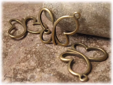 Berlock antik bronsfärgad fjäril 4-pack ca 17x19 mm