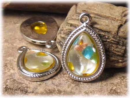 Hänge silverfoil multifäckig basfärg gul 28x19mm