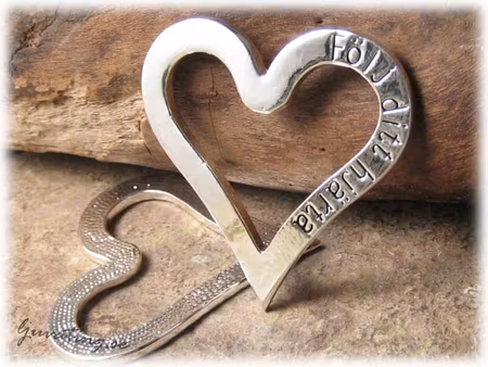 Stort konturhjärta med text Följ ditt hjärta