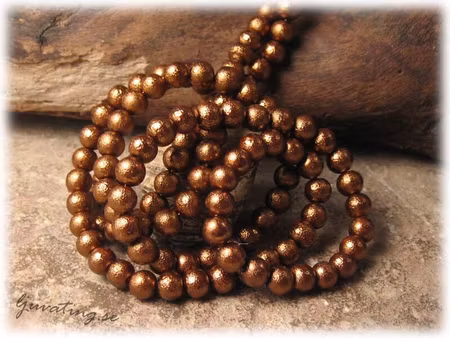 Guldbrun glaspärla med struktur 30-pack ca 6mm