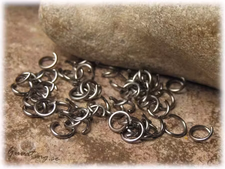 Öppna svarta bindringar 50-pack ca 5 mm