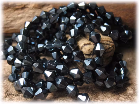 Blåsvart facetterad bicone 30-pack ca 6 mm