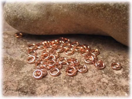 Bindringar ljust kopparfärgade 50-pack ca 4 mm