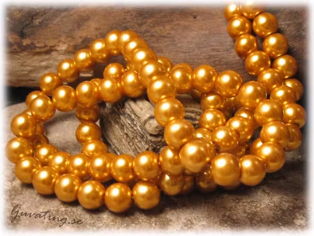 Pärlor i glas rund senapsgul 20-pack ca 8 mm