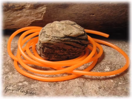 Gummislang rund ihålig neonorange tjocklek ca 2 mm