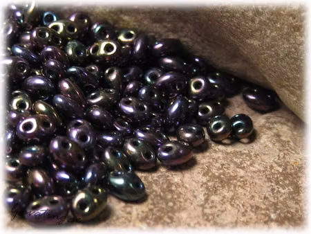Twin beads jet iris mörk lila ca 2,5x5 mm