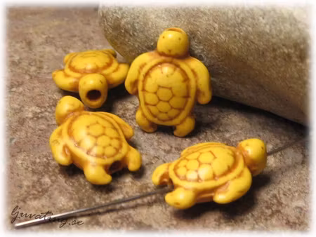 Sköldpadda i gul howlite ca 18x15 mm