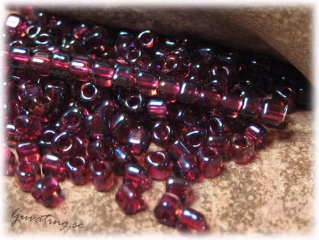 Miyuki triangel fancy dark rose 8/0