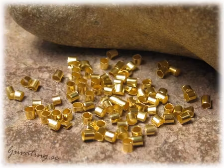 Klämtuber guldfärgade 100-pack ca 2 mm