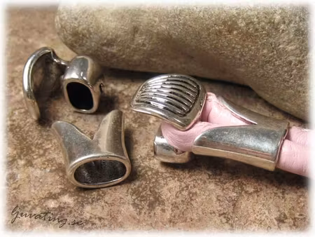 Tulpanlås i metall hål ca 10x5 mm