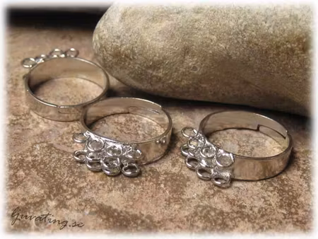 Ringstomme med 10 öglor justerbar platinafärgad