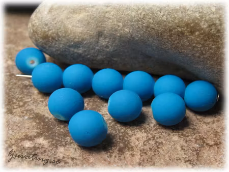 Blå glaspärla med gummiöverdrag 20-pack ca 8 mm