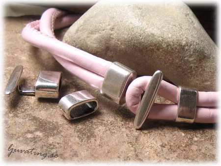 T-lås blanka till bla. läderband hål ca 10x5 mm