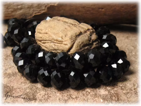 Svart facetterad glasrondell 10-pack ca 9x7 mm