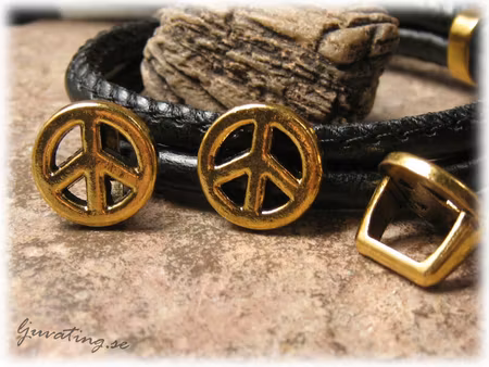 Slider peace guldfärgad metall stort hål ca 10x7mm