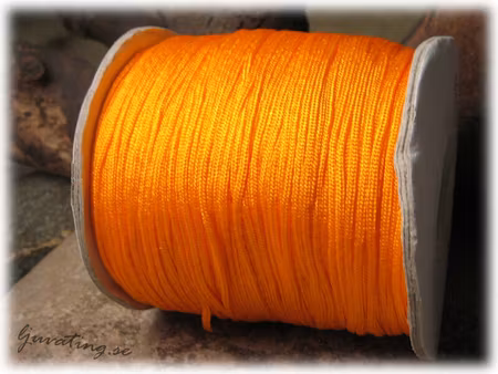 Vaxad tråd neonorange tjocklek ca 1,5 mm