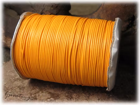 Vaxad tvinnad bomull ljus orange tjocklek ca 1 mm