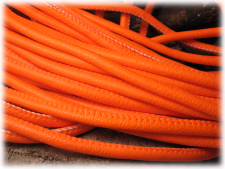 Orange läderimitation med söm tjocklek ca 5,5 mm
