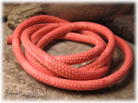 Mörkrosa mönstrat fuskläder med söm tjocklek ca5,5