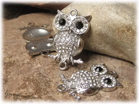 Connector platinafärg uggla clear strass ca32x20mm
